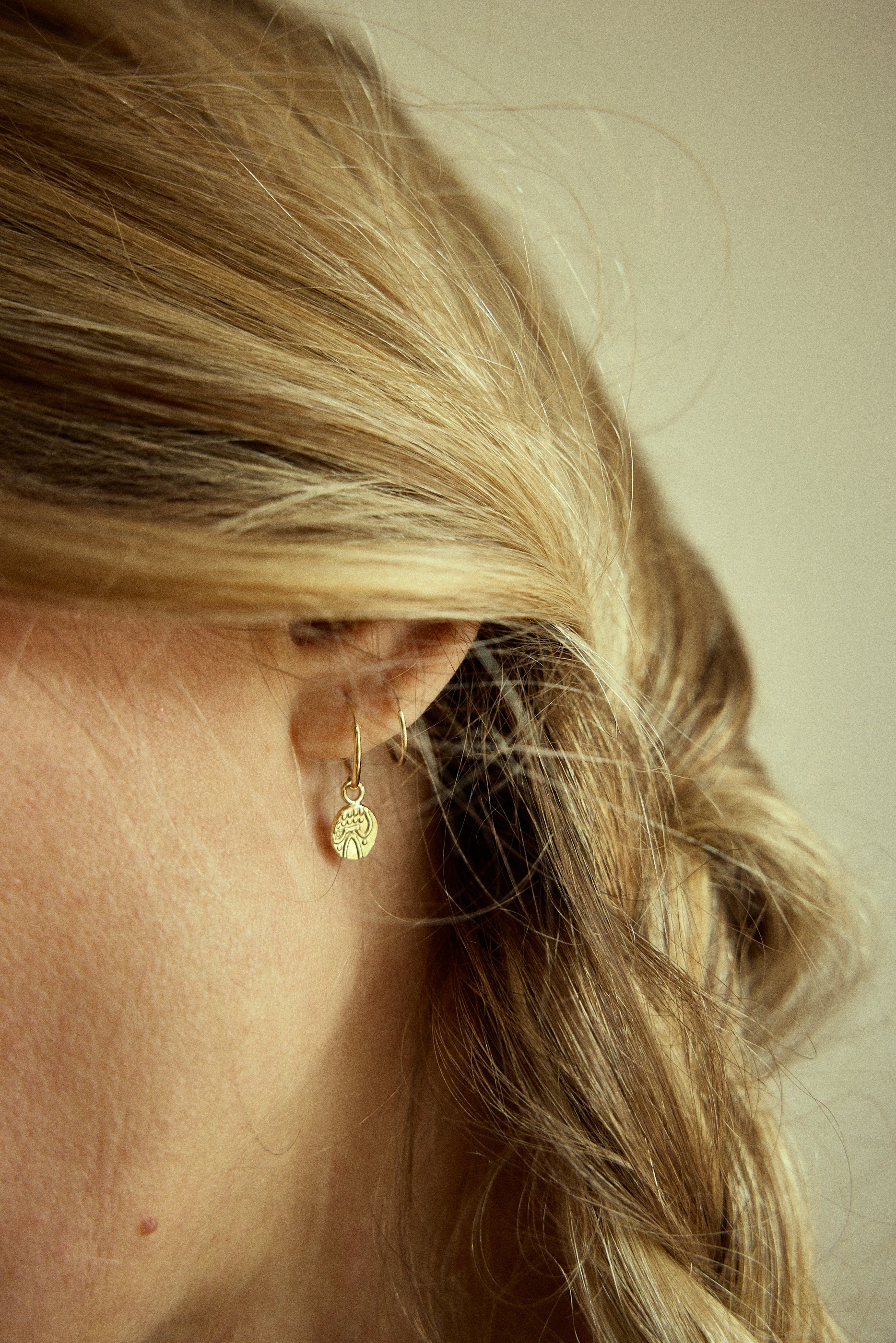 Mono boucle d'oreille et pièce Indienne